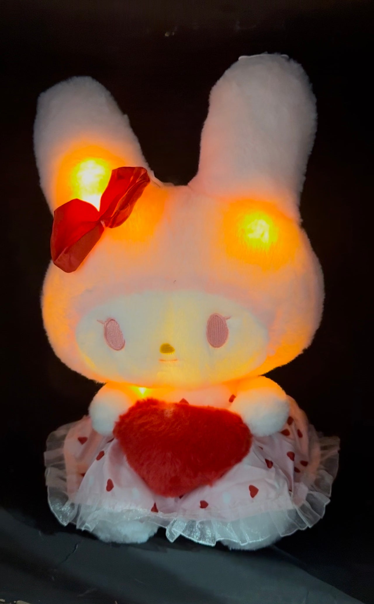 Peluche con luz y bolsa