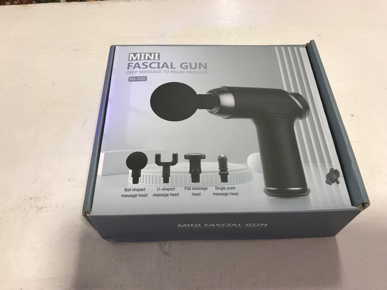 PISTOLA MASAJEADOR GUN CAJA AZUL CLARO