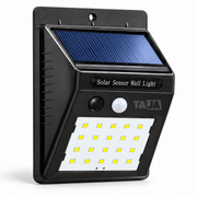 Lámpara solar TAJA HVH-40401 negra con panel solar y sensor PIR sobre fondo blanco